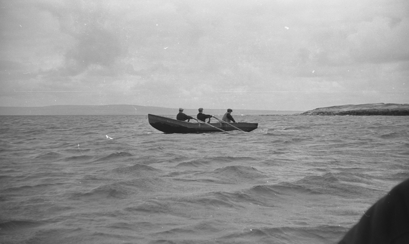 Inishere people on a boat